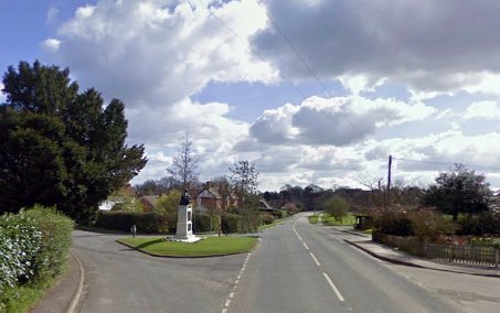 a view of converging roads in Benenden village in Kent, England