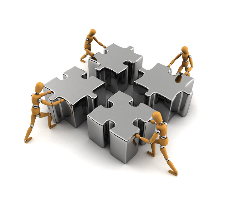 several puzzle pieces shown fitting together